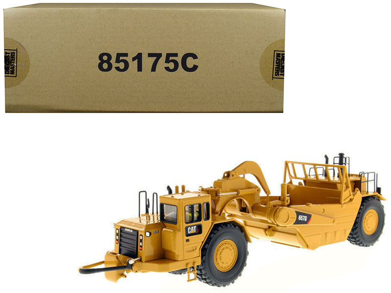 CAT Caterpillar 657 G Wheel Tractor Scraper with Operator "Core Classics Series" 1/50 Diecast Model by Diecast Masters free shipping USA